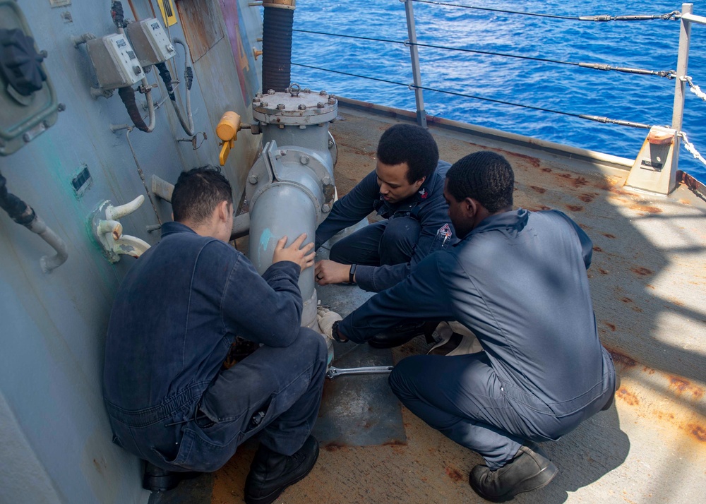 Sailors Conduct Maintenance Onboard USS Mustin