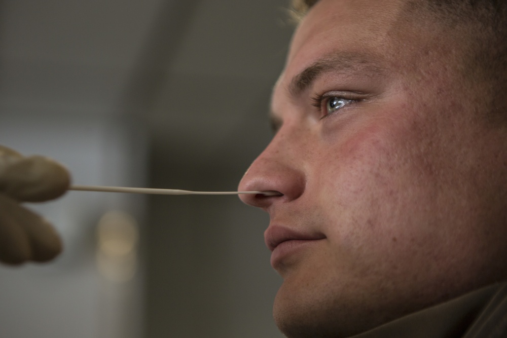 Testing, attention please | Marines conduct COVID testing upon arrival in the Republic of Palau