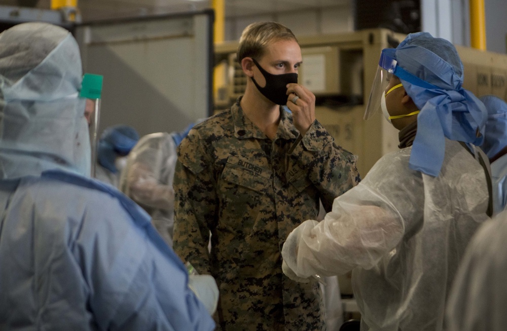 Testing, attention please | Marines conduct COVID testing upon arrival in the Republic of Palau