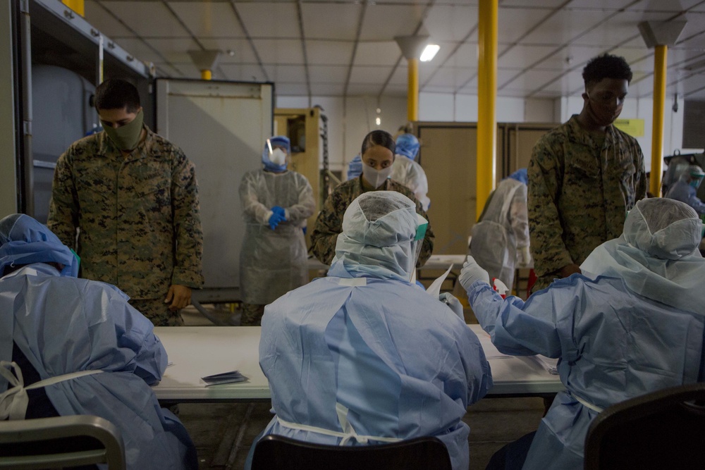 Testing, attention please | Marines conduct COVID testing upon arrival in the Republic of Palau