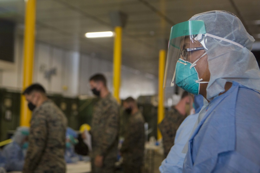 Testing, attention please | Marines conduct COVID testing upon arrival in the Republic of Palau