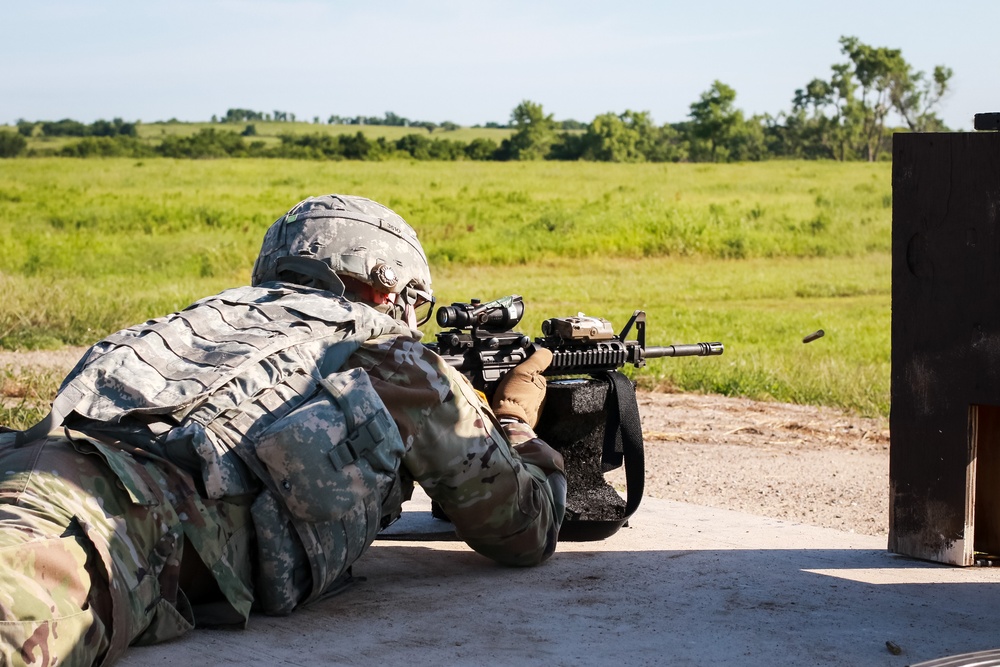 1st Infantry Division Soldiers perform rifle marksmanship qualification at the range.