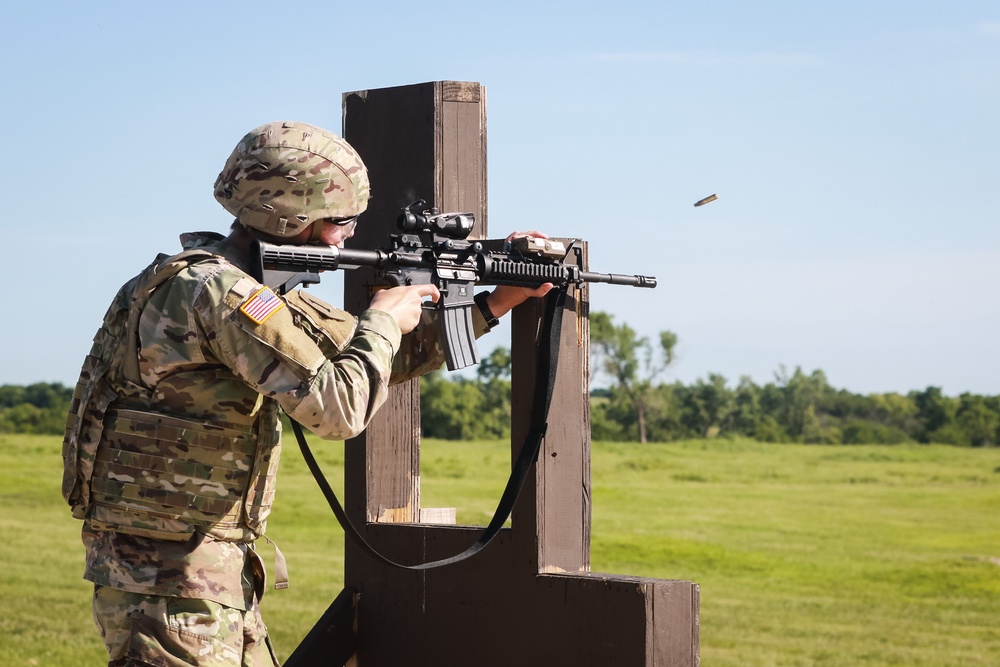 1st Infantry Division Soldiers perform rifle marksmanship qualification at the range.