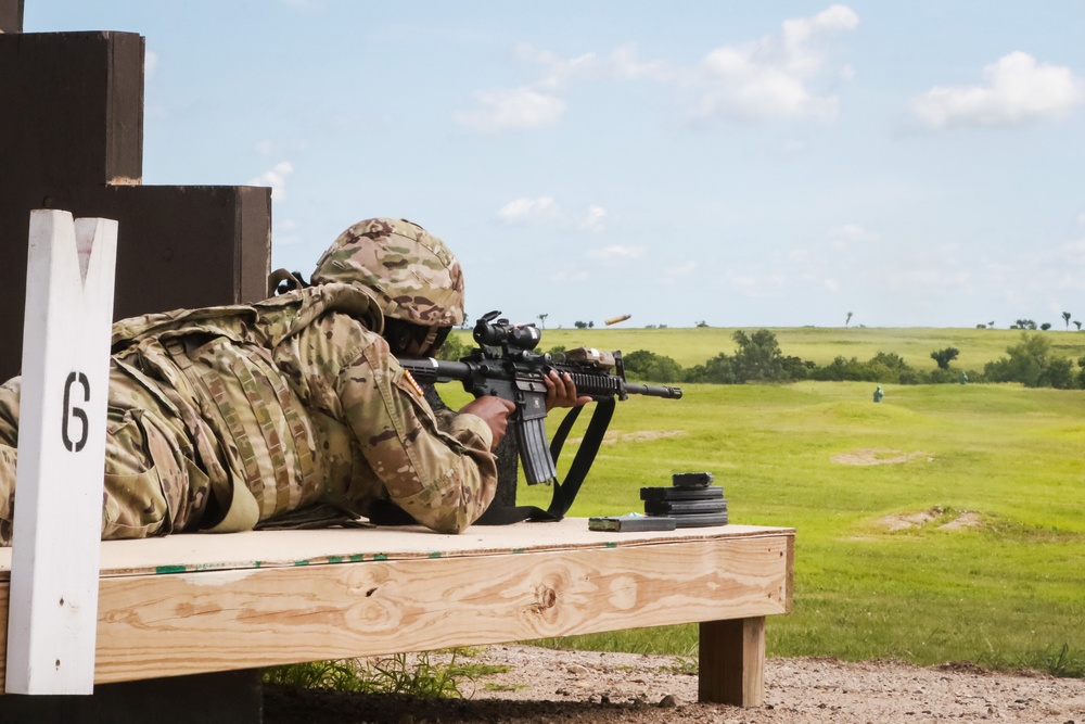 1st Infantry Division Soldiers perform rifle marksmanship qualification at the range.