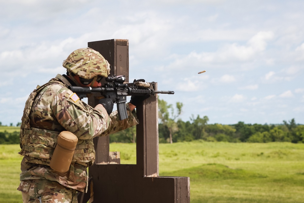 1st Infantry Division Soldiers perform rifle marksmanship qualification at the range.