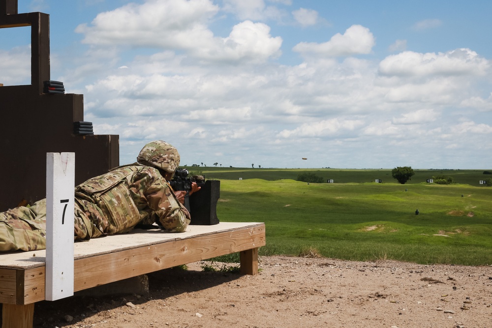 1st Infantry Division Soldiers perform rifle marksmanship qualification at the range.