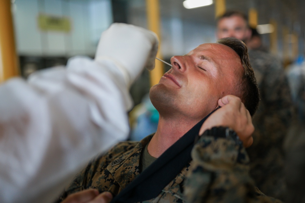 Testing attention please | Marines conduct COVID testing upon arrival in the Republic of Palau