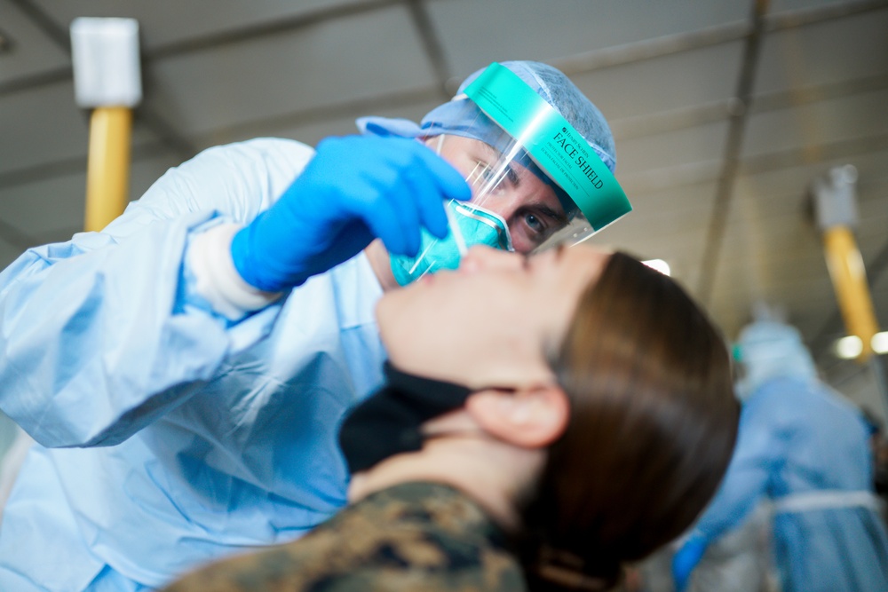 Testing attention please | Marines conduct COVID testing upon arrival in the Republic of Palau