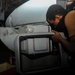 U.S. Navy Sailor Conducts Helicopter Maintenance
