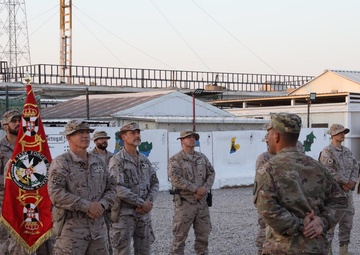 Coalition flag ceremony at Besmayah Range Complex