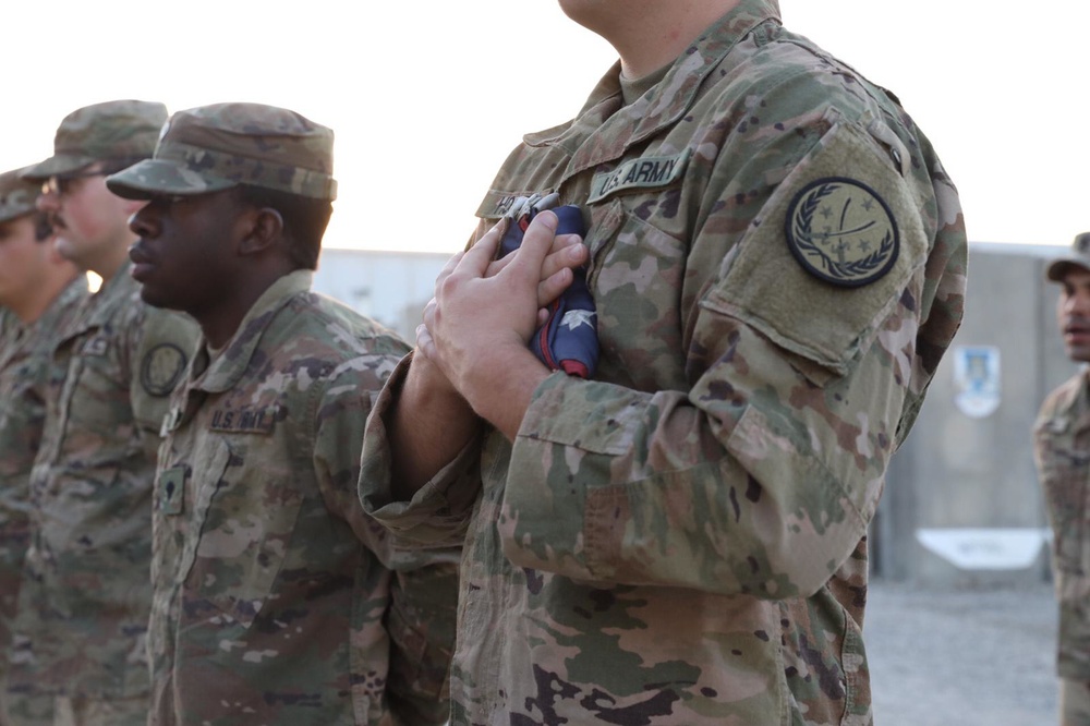Coalition flag ceremony at Besmayah Range Complex