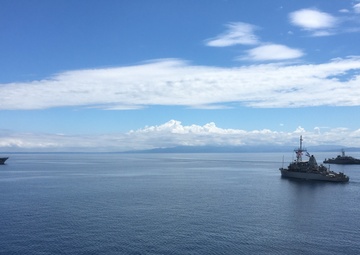 Crews of U.S. Navy and JMSDF mine countermeasures ships perform PASSEX upon conclusion of Mine Warfare Exercise (MIWEX) 2JA 2020