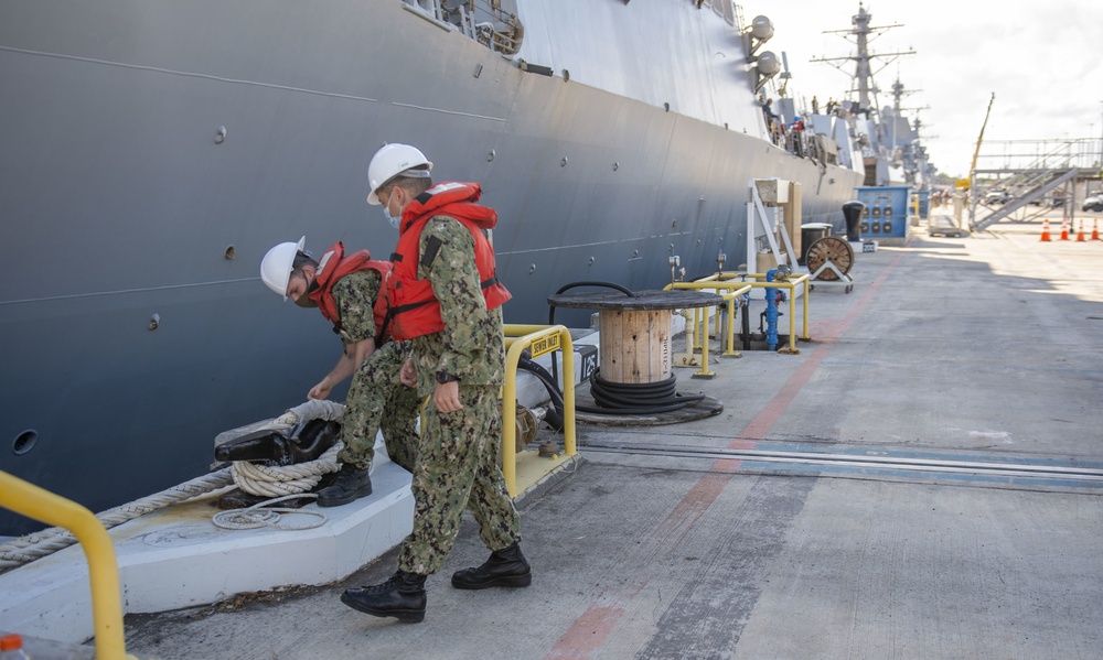 U.S. Navy ships get underway in preparation for Hurricane Douglas