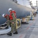 U.S. Navy ships get underway in preparation for Hurricane Douglas