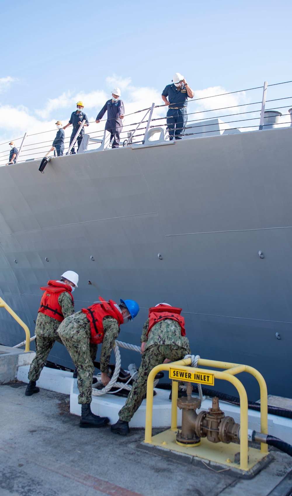 U.S. Navy ships get underway in preparation for Hurricane Douglas