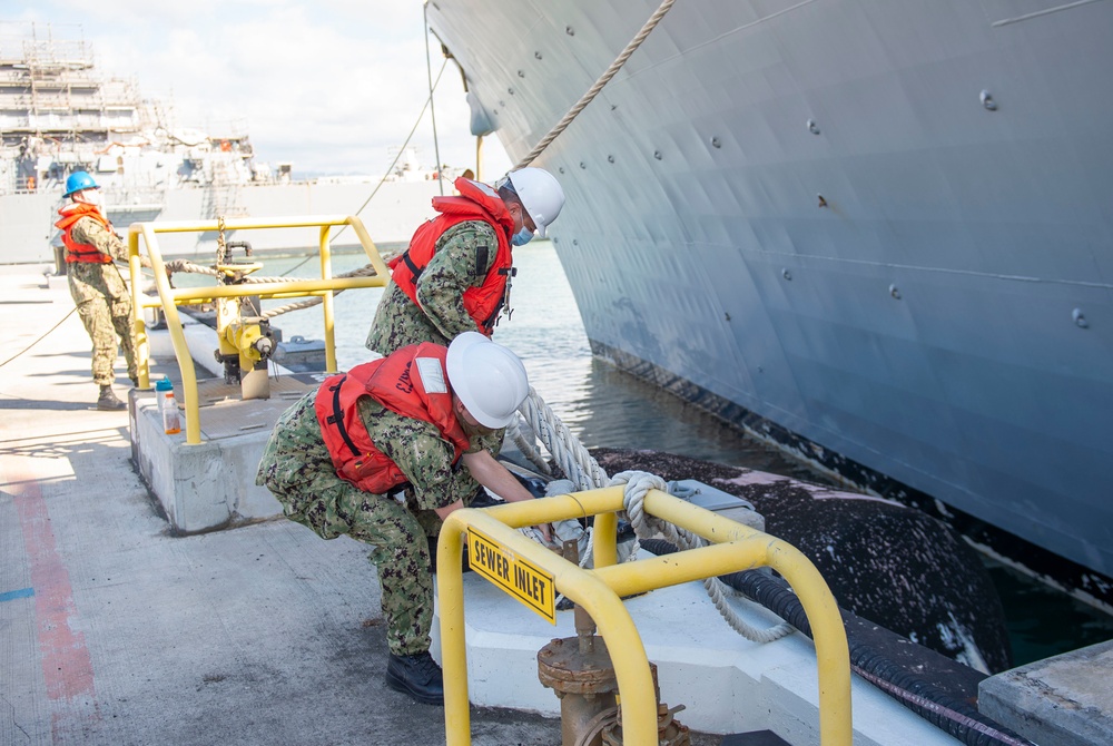 U.S. Navy ships get underway in preparation for Hurricane Douglas