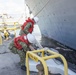 U.S. Navy ships get underway in preparation for Hurricane Douglas