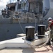 U.S. Navy ships get underway in preparation for Hurricane Douglas