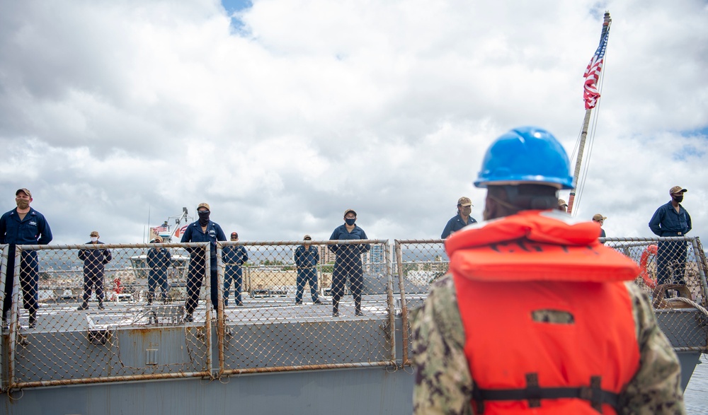 U.S. Navy ships get underway in preparation for Hurricane Douglas