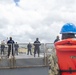 U.S. Navy ships get underway in preparation for Hurricane Douglas