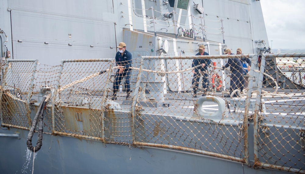 U.S. Navy ships get underway in preparation for Hurricane Douglas