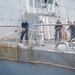 U.S. Navy ships get underway in preparation for Hurricane Douglas