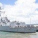 U.S. Navy destroyers get underway in preparation for Hurricane Douglas