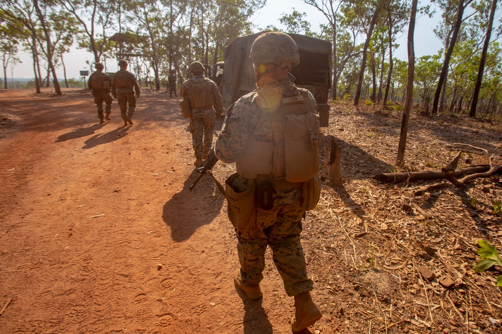 Marines participate in a live fire and maneuver range