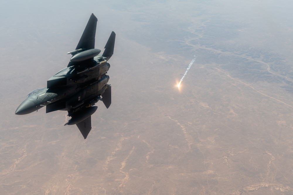 A U.S. Air Force KC-135 Stratotanker refuels F-15E Strike Eagle