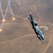 A U.S. Air Force KC-135 Stratotanker refuels A-10 Thunderbolts.