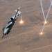 A U.S. Air Force KC-135 Stratotanker refuels A-10 Thunderbolts.