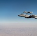 A U.S. Air Force KC-135 Stratotanker refuels A-10 Thunderbolts.