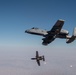 A U.S. Air Force KC-135 Stratotanker refuels A-10 Thunderbolts.