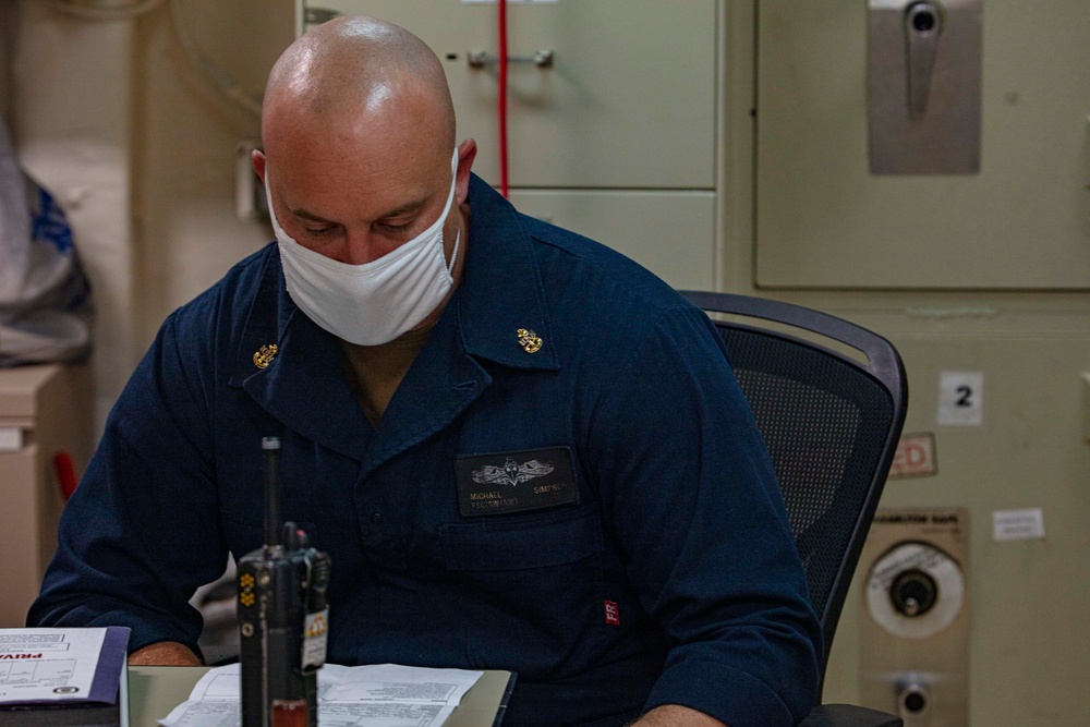 Sailors work in the personnel office