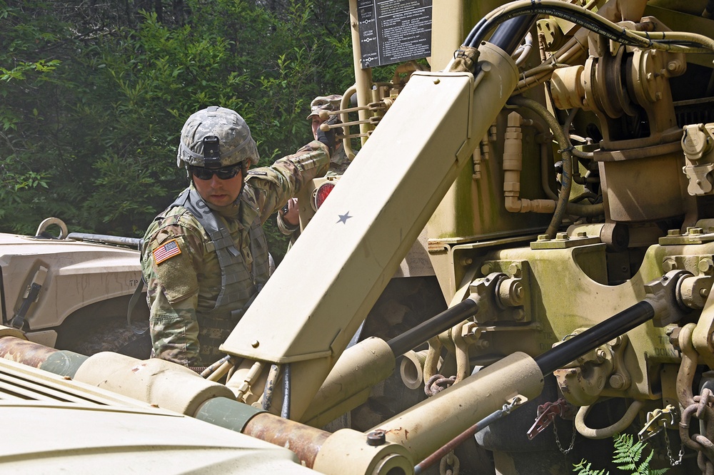 1073rd Maintenance Company Recover a Vehicle Under Simulated Fire During Northern Strike 20