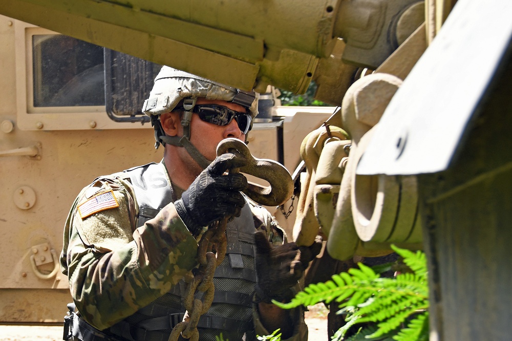 1073rd Maintenance Company Recover a Vehicle Under Simulated Fire During Northern Strike 20
