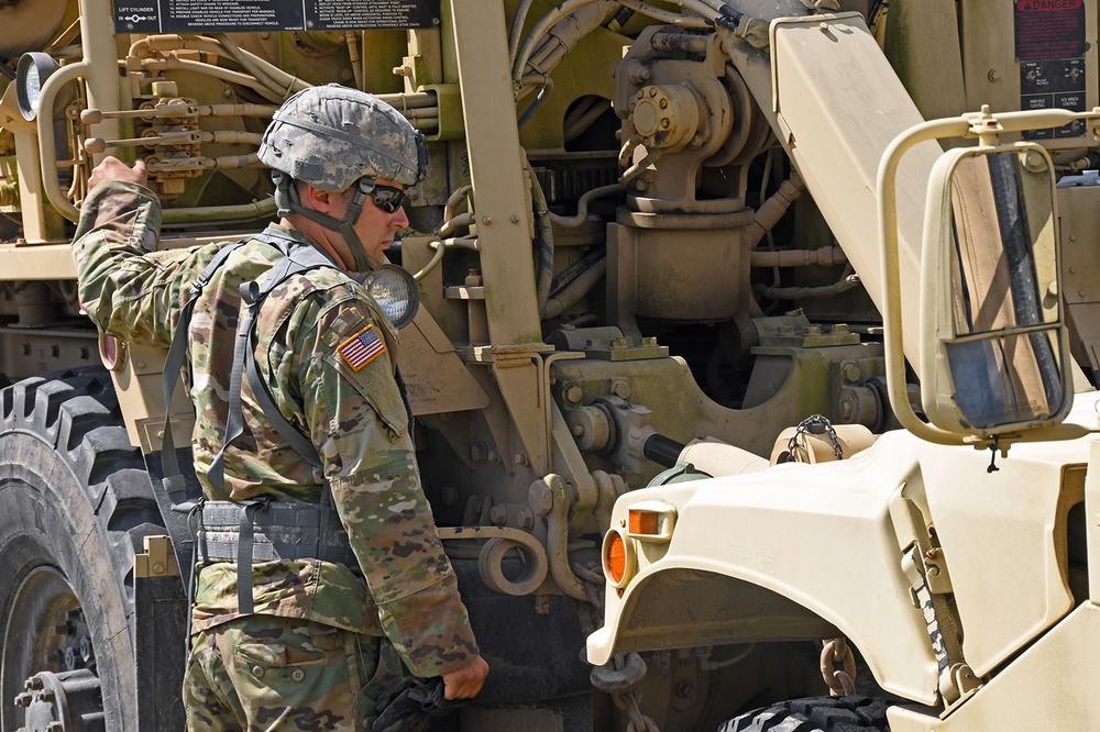 1073rd Maintenance Company Recover a Vehicle Under Simulated Fire During Northern Strike 20