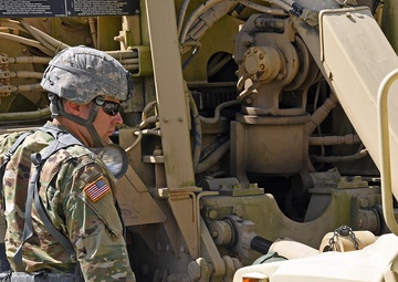 1073rd Maintenance Company Recover a Vehicle Under Simulated Fire During Northern Strike 20