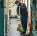 Sailors clean spaces aboard New York