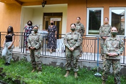 Soldiers nurture relationship with domestic violence shelter in Kosovo