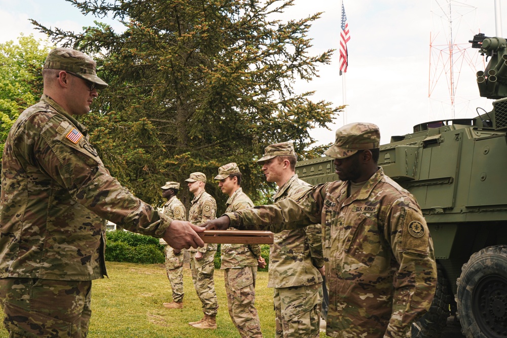 2CR Soldiers receive coins upon completion of the Murph Challenge