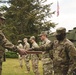 2CR Soldiers receive coins upon completion of the Murph Challenge