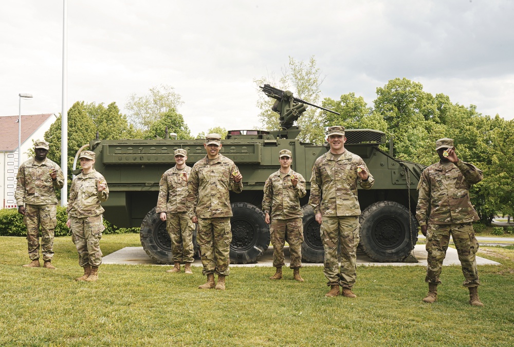 2CR Soldiers receive coins upon completion of the Murph Challenge