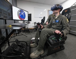 A 13th BS pilot trains with a VR simulator at WAFB
