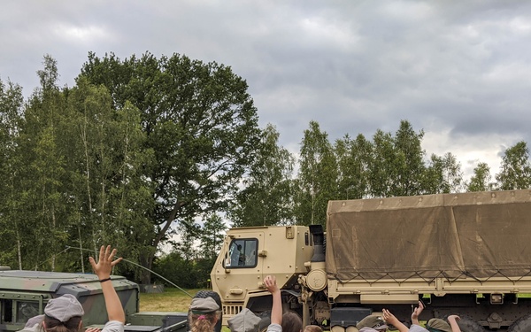 Soldiers stationed in Poland share experiences with local scouts
