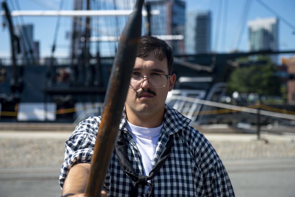 Aviation Electronic’s Mate 3rd Class Zachary Hansen-McPhail participates in pike drills with the crew of USS Constitution