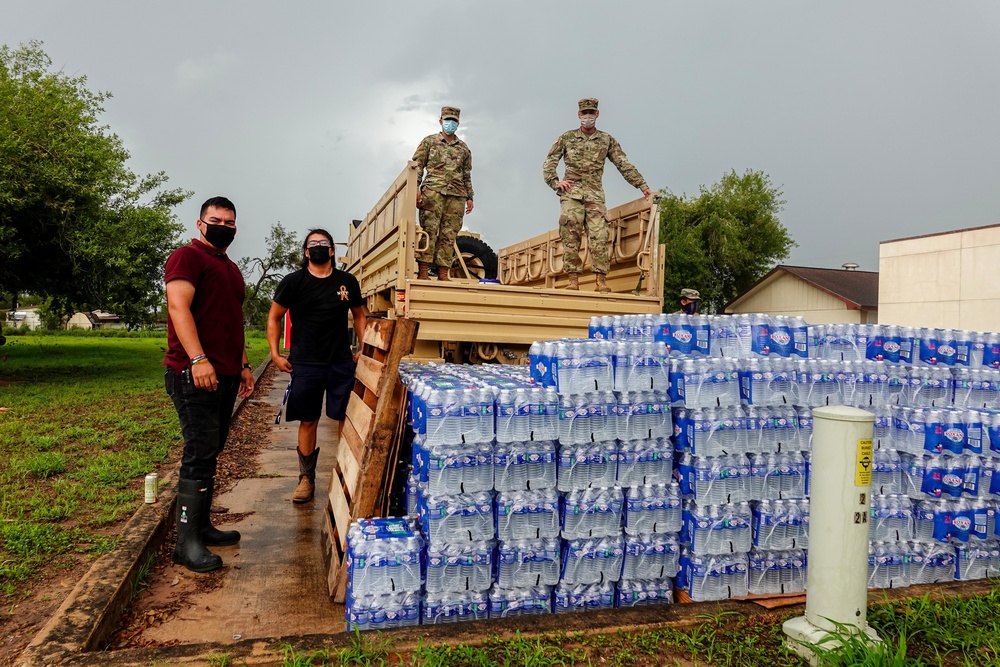 Texas Military Members deliver water and ice to south Texas towns affected by Hurricane Hanna