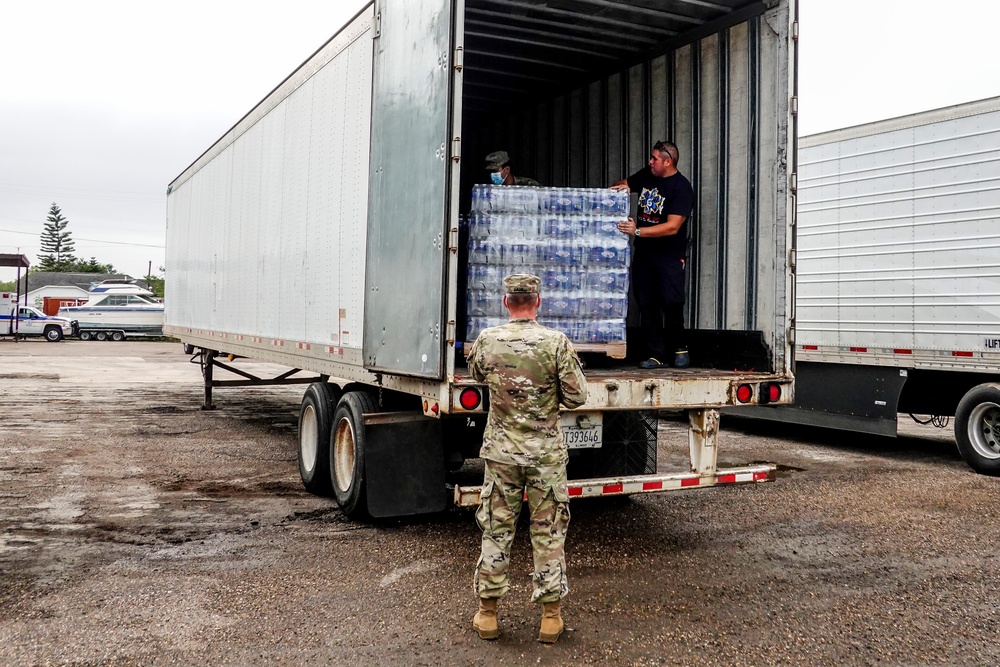 Texas Military Members deliver water and ice to south Texas towns affected by Hurricane Hanna