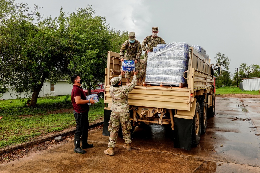 Texas Military Members deliver water and ice to south Texas towns affected by Hurricane Hanna