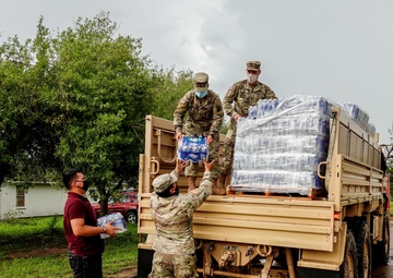 Texas Military Members deliver water and ice to south Texas towns affected by Hurricane Hanna